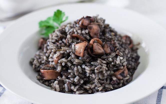 Calamares en su tinta con arroz